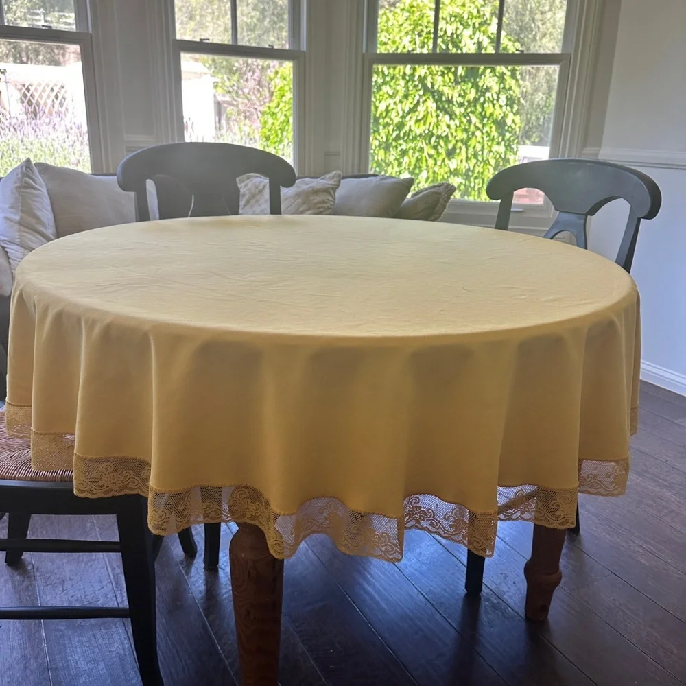 Vintage round yellow tablecloth with lace trim